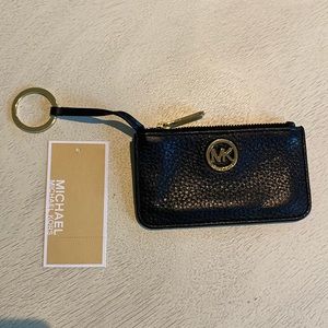 Michael Kors coin wallet.